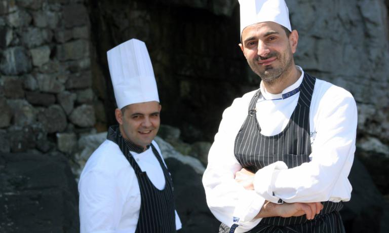 Domenico De Simone, chef at Bikini. Behind him, his sous chef Antonino De Simone