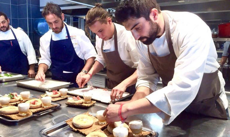 Riccardo Gaspari yesterday at Alice in Milan as he was dishing out his Pizza Moretti, the dish that got him to win the fifth edition of Premio Birra Moretti Grand Cru